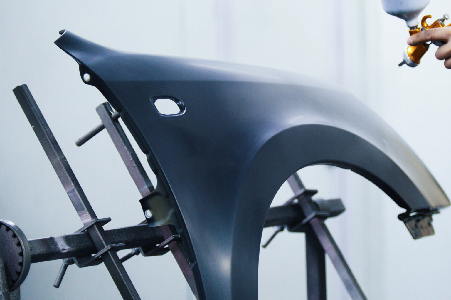 Electrostatic Application process showing professional powder coating application